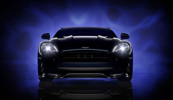 Photograph John Early Aston Martin Vanquish Volante on One Eyeland